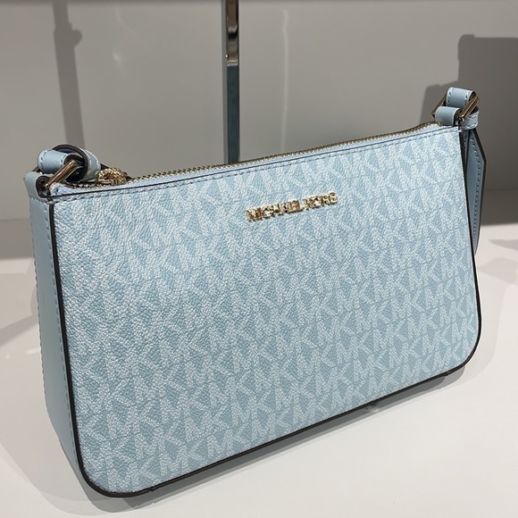 MICHAEL KORS 💙
Jet Set Travel Small Logo Shoulder crossbody Bag tech Pouches - Picture 10 of 13